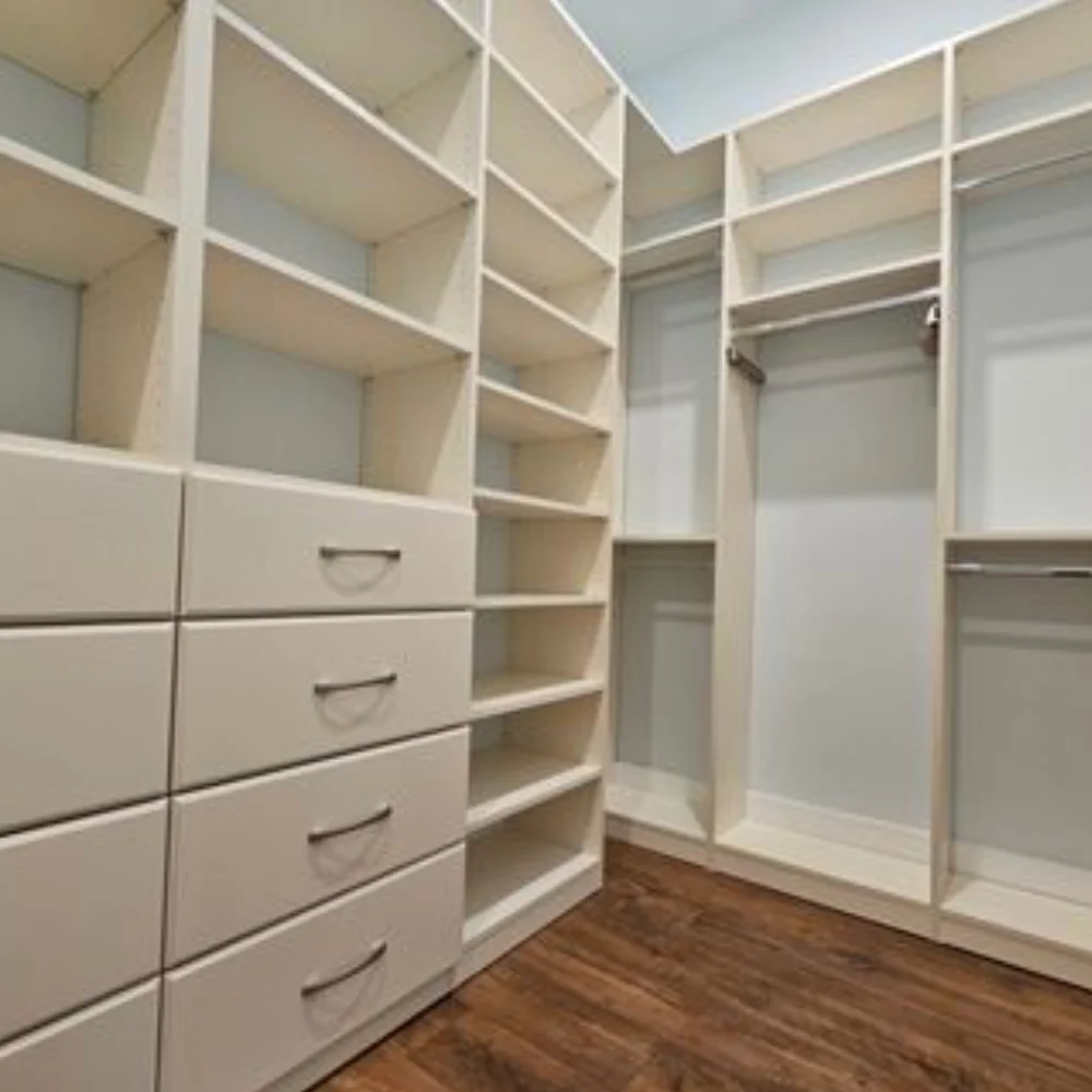 Luxury bespoke walk-in closet and integrated personalized wine and Prosecco bar designed and built by Power Pro Maintenance & Repairs LLC in Jacksonville, FL. Features custom walnut cabinetry, LED lighting, and marble countertops.